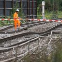 Men on the railway between Rastatt and Karlsruhe, where the land slip happened. Photo credit: Benedikt Spether