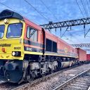 Ground level shot of Freightliner 66503 with container train