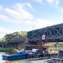 First train crosses the rebuilt Nuneham Viaduct over the River Thames in Oxfordshire