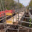 Repair work at Forster's Bridge in Ketton showing scaffolding and demolished track section