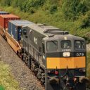 Irish intermodal train in open countryside