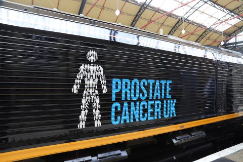 Prostate Cancer many-men logo on the body of a GBRf locomotive