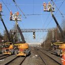 Engineers erecting electric wires over the Midland Main Line