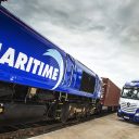 Maritime locomotive and Mercedes truck stand side by side