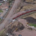 Aerial view of Royal Mail EMU passing through Carstairs Junction