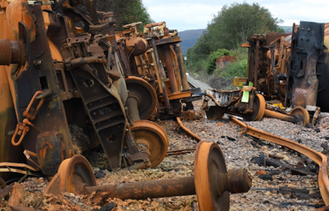 Close up of derailed and burned-out tank wagons