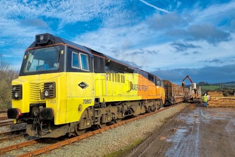 Colas Class 70 locomotive at the head of a timber train