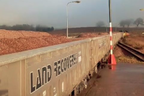 Loaded aggregates train at Ravenstruther carrying wagons full of red granite