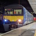 Head on view of Class 321 EMU ready to depart from platform at Birmingham International